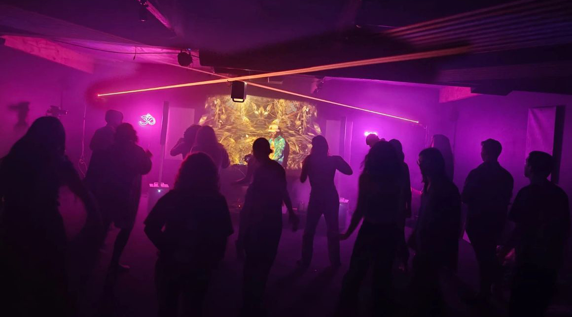 People dancing to DJ